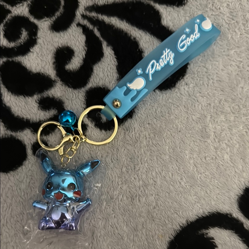 Blue Pikachu Keychain with Wrist Strap! Clip is easy to open for adding keys New